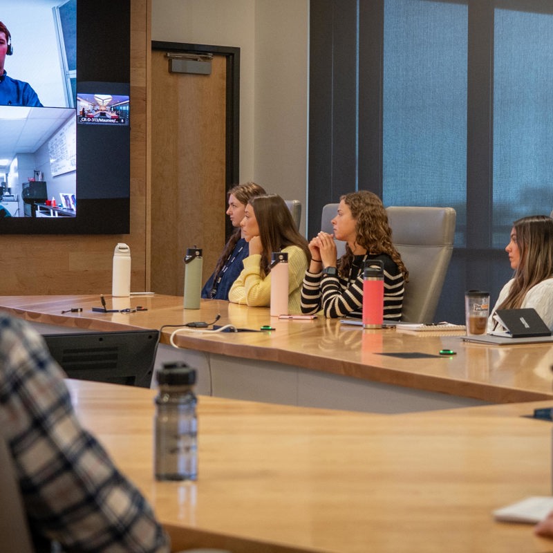 Interns listening to a presentation in The Andersons board room