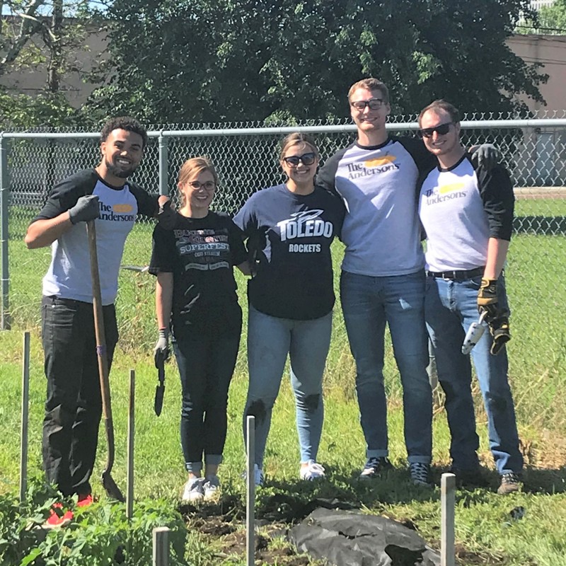 Interns volunteering at a community garden
