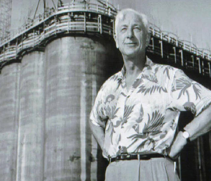 Harold Anderson standing in front of The Big Pour silos