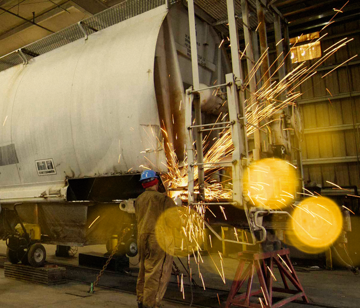 Individual working on a railcar