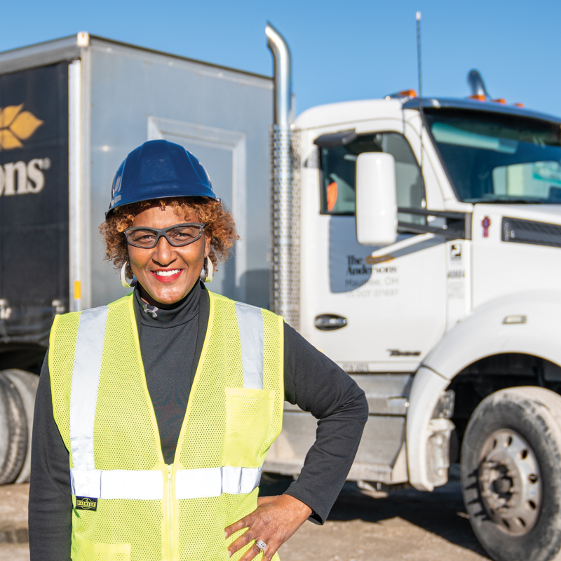 Individual standing next to The Andersons semi truck